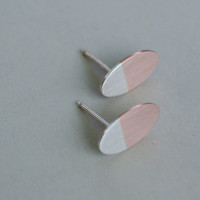 silver and copper oval earings
